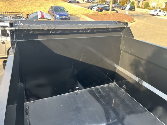 Clean, empty trailer bed after a haul