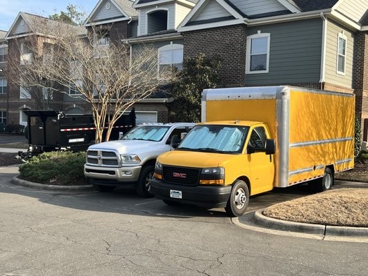Yellow Martinez Movers box truck ready for a move